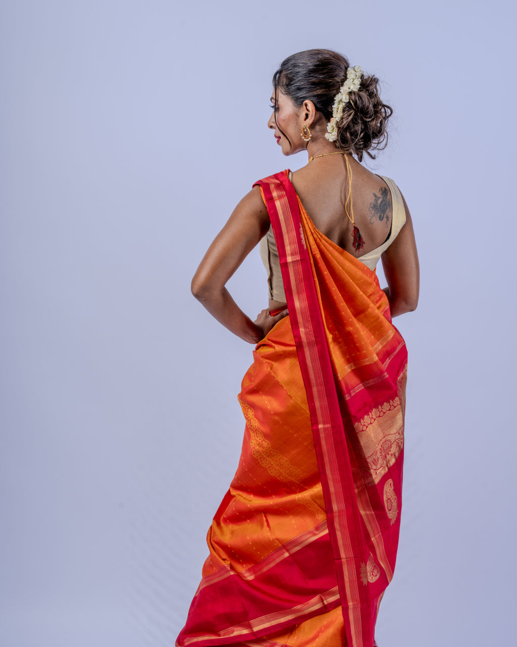 Orange woven pure zari Kanjeevaram saree