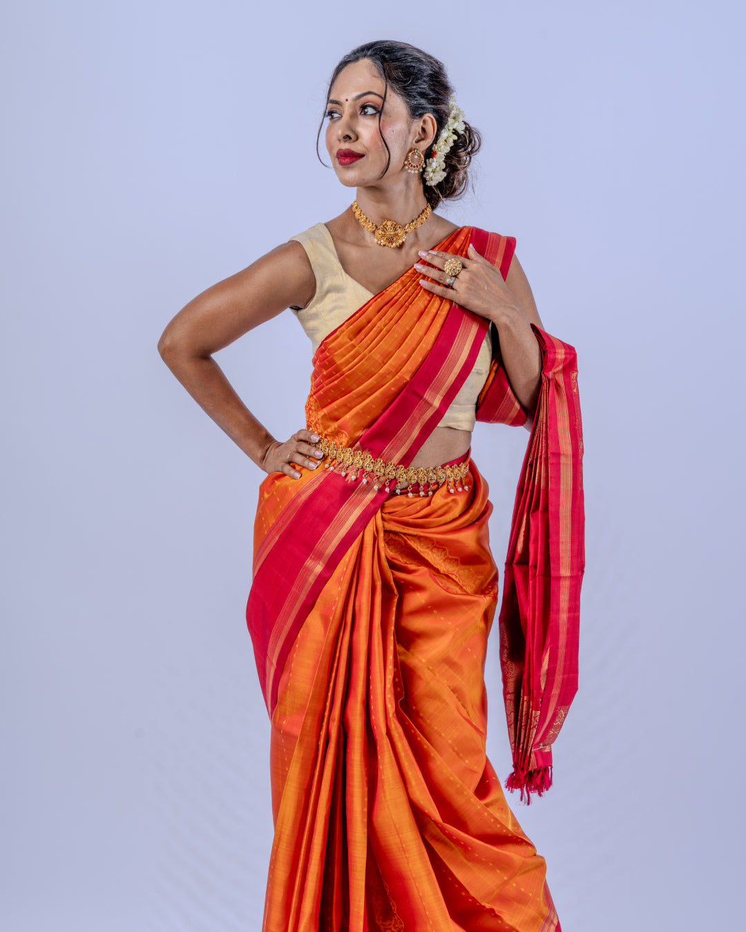 Orange woven pure zari Kanjeevaram saree