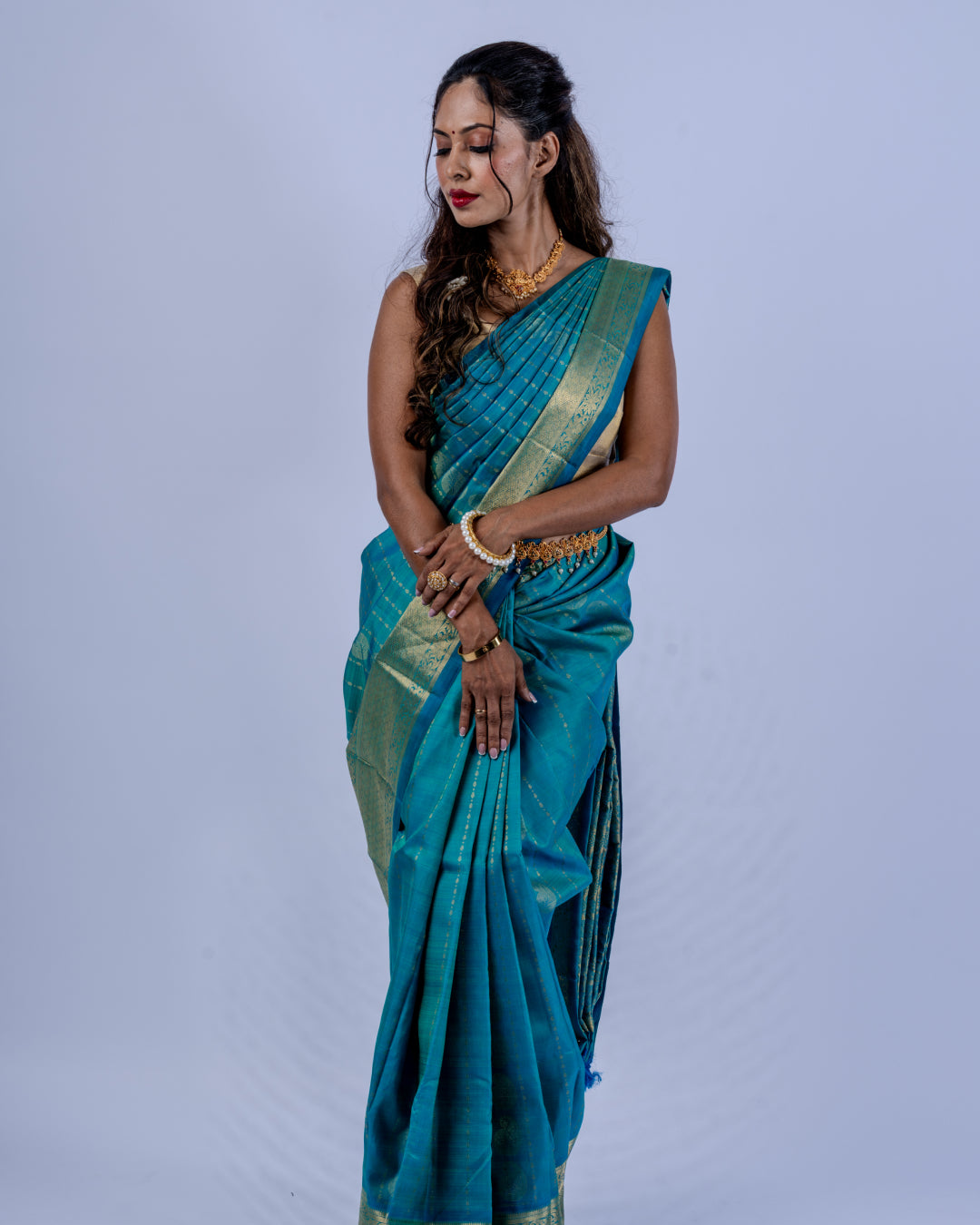 Teal blue woven pure zari Kanjeevaram saree