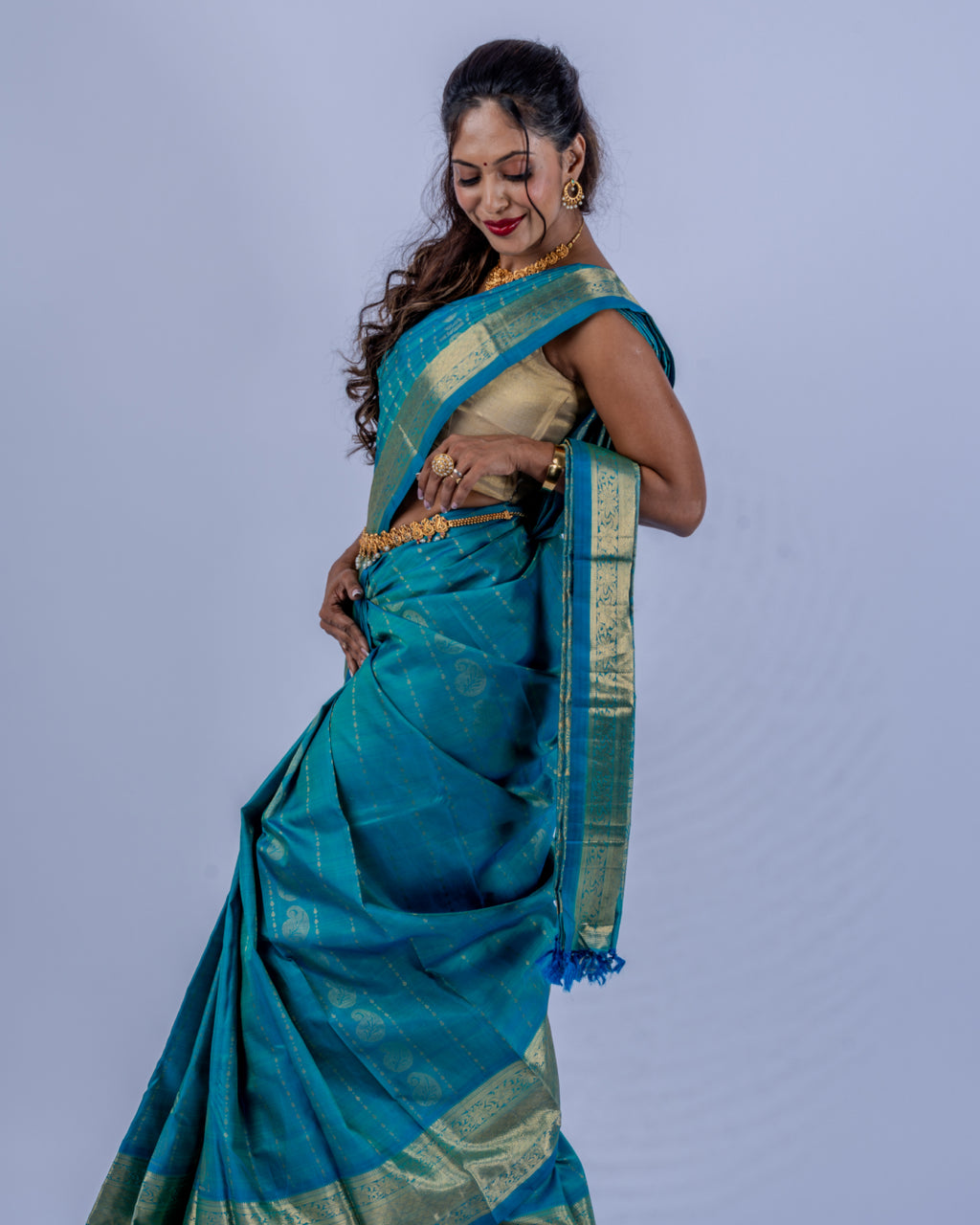 Teal blue woven pure zari Kanjeevaram saree