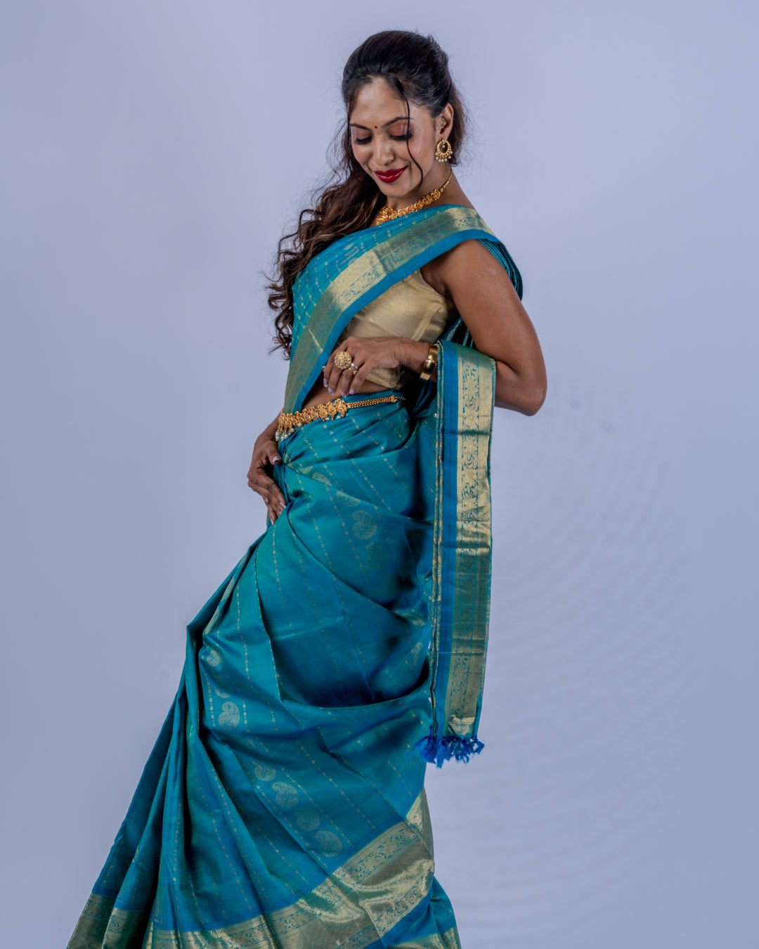 Teal blue woven pure zari Kanjeevaram saree