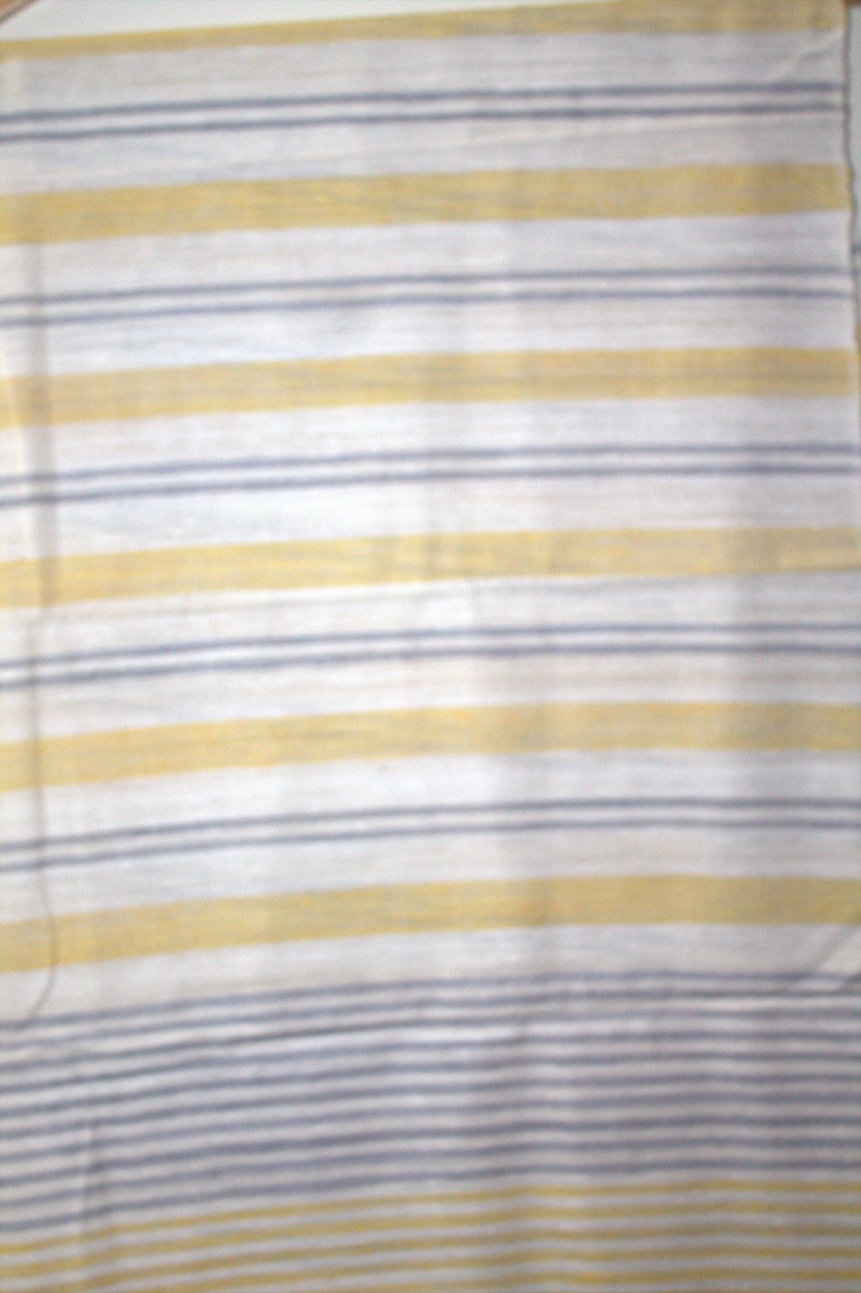 Ivory Eri stole with turmeric dyed eri